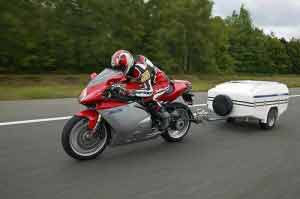 sport motorbike pull behind motorcycle trailer going fast